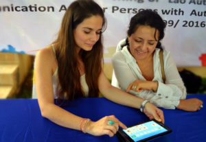 members from team colombia try out a new app for persons with autism spectrum disorder